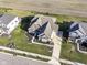 Aerial view showcasing home's exterior and landscaping at 12535 Tidecrest Dr, Fishers, IN 46037
