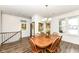 Formal dining room featuring hardwood floors and a wooden table at 12535 Tidecrest Dr, Fishers, IN 46037
