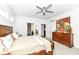 Main bedroom with king bed, dresser and access to a full bathroom at 12535 Tidecrest Dr, Fishers, IN 46037