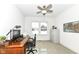 Home office with large desk, computer, and ample storage at 12535 Tidecrest Dr, Fishers, IN 46037