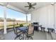 Covered patio features a grill and outdoor dining set at 12535 Tidecrest Dr, Fishers, IN 46037