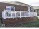A wood deck with white railings, a great place to relax at 4326 Switchgrass Way, Indianapolis, IN 46237