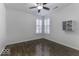 Bright bedroom with wood floors, plantation shutters, and built-in shelves at 4326 Switchgrass Way, Indianapolis, IN 46237