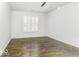 Bright bedroom with wood floors and plantation shutters at 4326 Switchgrass Way, Indianapolis, IN 46237