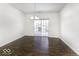 Dining room with hardwood floors and sliding glass doors to patio at 4326 Switchgrass Way, Indianapolis, IN 46237