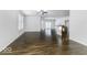 Bright living room with hardwood floors and sliding glass doors to patio at 4326 Switchgrass Way, Indianapolis, IN 46237