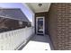 Covered porch with white railings offering shade at 4326 Switchgrass Way, Indianapolis, IN 46237
