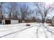 Spacious backyard with shed and snow on the ground at 3359 Laurel St, Indianapolis, IN 46227