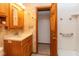 Bathroom with updated vanity and tiled shower/tub combo at 3359 Laurel St, Indianapolis, IN 46227