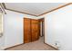 Spacious bedroom with double closets and neutral carpeting at 3359 Laurel St, Indianapolis, IN 46227