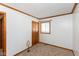 Bright bedroom with a window and neutral carpeting at 3359 Laurel St, Indianapolis, IN 46227