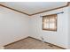 Well-lit bedroom with a window and neutral carpeting at 3359 Laurel St, Indianapolis, IN 46227