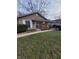 Exterior view of charming ranch home with brick accents at 3359 Laurel St, Indianapolis, IN 46227