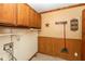 Laundry room with washer and dryer hookups and ample storage at 3359 Laurel St, Indianapolis, IN 46227