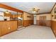 Spacious living room featuring hardwood floors and built-in shelving at 3359 Laurel St, Indianapolis, IN 46227