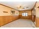 Bright living room with large window and ceiling fan at 3359 Laurel St, Indianapolis, IN 46227