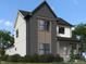 Exterior of a two-story home with a mix of gray and white siding and a well-manicured lawn at 16525 Iron Tree Ct, Westfield, IN 46074