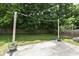 Cozy backyard showcasing a patio area with string lights and a well-maintained lawn at 5171 Alpine Violet Way, Indianapolis, IN 46254