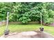 Overhead view of a backyard with a small lawn and a patio area with wooden supports at 5171 Alpine Violet Way, Indianapolis, IN 46254