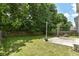 Private backyard featuring a patio area with string lights, perfect for outdoor entertaining at 5171 Alpine Violet Way, Indianapolis, IN 46254