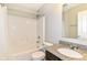 Bathroom featuring tile and a shower-tub combination with a shower curtain at 5171 Alpine Violet Way, Indianapolis, IN 46254