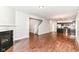 Open floor plan showcasing the living room, staircase, and modern kitchen at 5171 Alpine Violet Way, Indianapolis, IN 46254