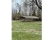 Carport located in a yard near bare trees at 8418 S State Road 39, Clayton, IN 46118