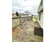 Wooden deck with lattice railing, providing an outdoor space for relaxing and entertaining with backyard views at 8418 S State Road 39, Clayton, IN 46118