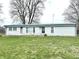Charming home with white siding, well-maintained lawn, and a welcoming front entrance, offering a comfortable living space at 8418 S State Road 39, Clayton, IN 46118