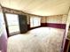 Living room with front door and large window providing an abundance of light at 8418 S State Road 39, Clayton, IN 46118