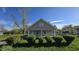 Charming home featuring tidy landscaping and a welcoming covered porch at 4745 W Legrande Ave, Indianapolis, IN 46241