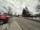 Gated community entrance with security booth at 7317 Lions Head Dr # 2, Indianapolis, IN 46260