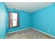 Empty bedroom with a large window for natural light at 11218 Boston Way, Fishers, IN 46038
