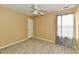 Neutral bedroom with tile floors, a ceiling fan, and a window at 11218 Boston Way, Fishers, IN 46038