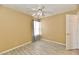 Neutral bedroom with tile floors, a window, and curtains at 11218 Boston Way, Fishers, IN 46038