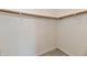 Walk-in closet with shelf and hanging rod at 11218 Boston Way, Fishers, IN 46038