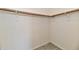 Walk-in closet with shelf and hanging rod at 11218 Boston Way, Fishers, IN 46038