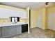 Spacious kitchen with abundant counter space and white overhead cabinets at 11218 Boston Way, Fishers, IN 46038