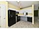 Traditional kitchen featuring modern appliances and ample cabinet space at 11218 Boston Way, Fishers, IN 46038