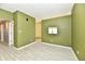 Cozy living room featuring tiled floors and doorway access to other rooms in the home at 11218 Boston Way, Fishers, IN 46038
