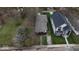 Two homes side-by-side with green lawns at 1529 Harlan St, Indianapolis, IN 46203