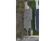 Property featuring a gray roof and small front yard at 1529 Harlan St, Indianapolis, IN 46203