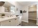 Elegant bathroom with white vanity, quartz countertop, and walk-in shower at 1529 Harlan St, Indianapolis, IN 46203