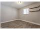Cozy bedroom with wood-look floors and floating shelves at 1529 Harlan St, Indianapolis, IN 46203