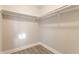 Spacious closet with built-in shelving and hanging rod at 1529 Harlan St, Indianapolis, IN 46203