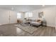 Bright living room with gray sectional sofa and stylish decor at 1529 Harlan St, Indianapolis, IN 46203