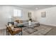 Relaxing living room with gray sectional and stylish decor at 1529 Harlan St, Indianapolis, IN 46203