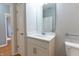 Small bathroom with single vanity and white cabinets at 4208 Payne Dr, Plainfield, IN 46168