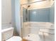 Walk-in shower with grab bars and light blue tile at 4208 Payne Dr, Plainfield, IN 46168