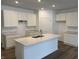 Modern kitchen featuring white cabinets and quartz countertops at 5226 Woodhurst Ln, Indianapolis, IN 46239